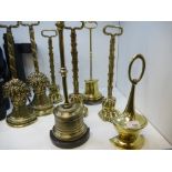 Eight various Georgian and later brass doorstops to include three paw foot examples -8-