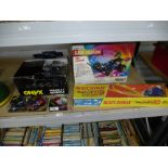 A box of 24 Onyx Formula One model cars, a Matchbox loop set and a Nikko radio controlled car