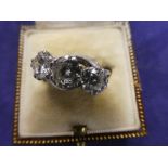 Three stone diamond ring on a platinum shank, stamped PLAT, total diamond weight approx 2.5ct,