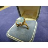 Lady's 9ct rose gold ring set with an opal daublet, shank stamped 9ct, size Q/R