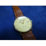 Gent's Hermes quartz wristwatch in a 9ct yellow gold case, stamped 375, on a tan leather strap