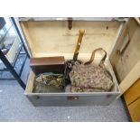 A German Military trunk containing clothing, belts, a shovel and other items