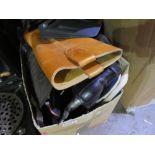 Two boxes of mixed clothing to include jackets, cowboy boots, ice skates, handbages, motorbike