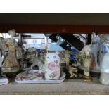 A small quantity of ceramic ornaments to include figurines, houses, fairies, etc