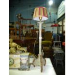 Pair of tall table lamps with one other and a Rugby ball