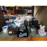 A quantity of collectable items to include a Nat West Wade pig x 2, drinking vessels, elephants, etc