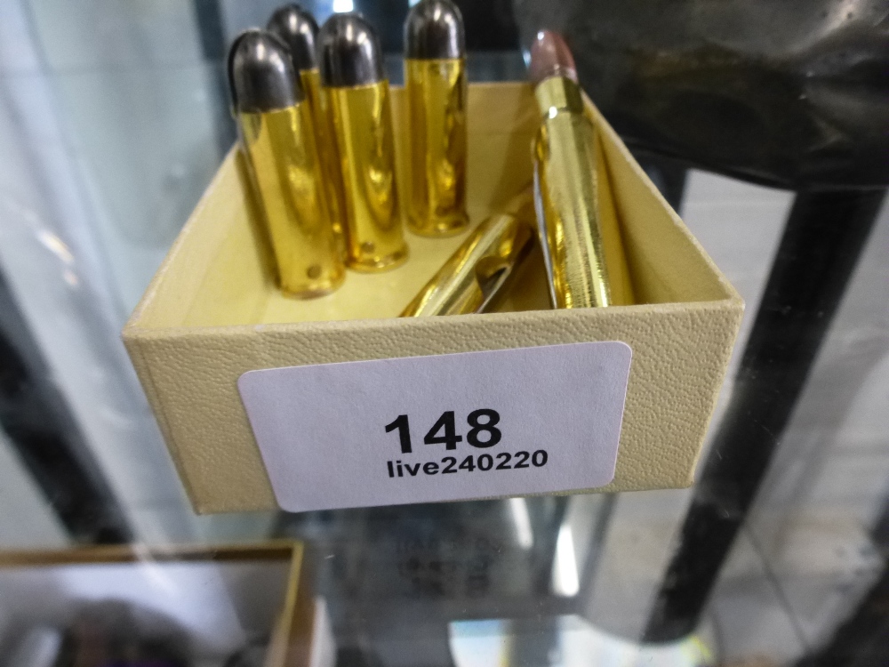 6 brass bullet penknives