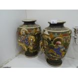 A similar pair of Satsuma baluster vases, 32cms.