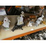 A quantity of ceramic animals to include a giraffe, lion, panda, etc