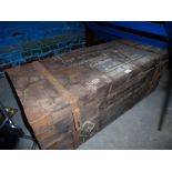 Large wooden and metal bound trunk with local address inscribed