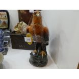 A Royal Doulton Golden Eagle decanter containing Whyte and Mackay Whiskey