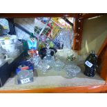 A quantity of glassware to include candlesticks, vases, Swarovski collectables, etc