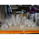 Quantity of cut glass including decanters jug, large vase, etc