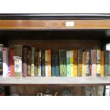 Shelf of hardback books including Enid Blyton, Lewis Carroll, Lord Byron, etc