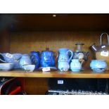 Shelf of blue glazed pottery items, from Devon and Cornwall, etc