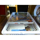 A crate of vintage postcards/annuals etc.