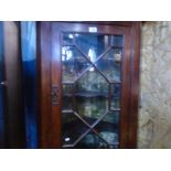 Victorian mahogany hanging corner cupboard with glazed doors.