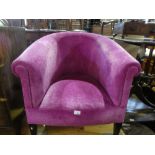 Contemporary purple upholstered tub chair and grey retro footstool