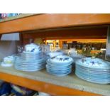 A quantity of Royal Worcester 'Evesham' china, including plates, saucers, sewing dishes, etc