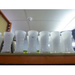 14 white glass vases