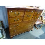 An Edwardian mahogany chest of drawers with chequer inlaid decoration, 93.5cms