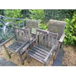 Four teak garden chairs
