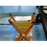 Pair of blue folding Director's chairs and a cream Lanson example