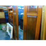 Edwardian mahogany wardrobe with central mirror flanked by doors