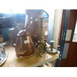 A copper kettle, copper coal bucket and brassware