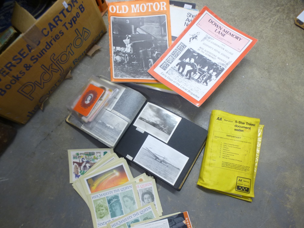 A small box of ephemera to include postcards, black and white photo etc