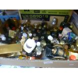 A small box of alcohol miniatures and a small quantity of cutlery