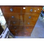 Tall and narrow heavy mahogany chest of 2 short over 5 long drawers