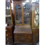 Inlaid mahogany glazed bureau bookcase on cabriole supports