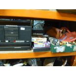 A Panasonic stereo music system, boxed computer games, handbags and sundries