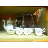 Two Edinburgh crystal decanters with boxes and a small quantity of Royal Albert Moss Rose teaware