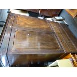 A Victorian mahogany lined press enclosing four sliding shelves, 130cms