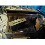 Four metal ammunition boxes with a vintage canvas trunk