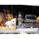 A box of sundry items to include wooden boxes, decanter, vases, along with two cased typewriters,