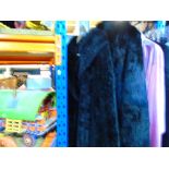 Black fur coat and faux mink example