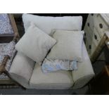 Contemporary cream fabric armchair