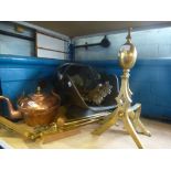 A large copper coal skuttle, copper tea pot, brass fire utensils, brass fire dogs