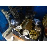 Metal bench ends, with a box of metal items to include, clocks, kettles, pots, etc