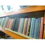 A whole shelf of hardback books to include Charles Dickens novels, Railway World annuals and SPBC