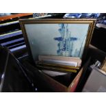 A large box of framed and glazed pictures of beach scenes