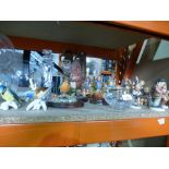 A quantity of Hummel figures, Stuart candlestick, country artists animals