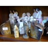 Quantity of ceramic figurines including cherubs playing muscial instruments, Knight on horseback and