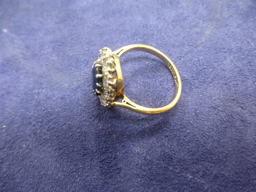 Sapphire and diamond cluster style ring on an 18ct yellow gold and platinum shank, stamped N gross - Image 2 of 2