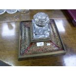 A late Victorian boulle square inkstand with glass inkwell having tortoiseshell and brass inlaid