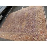 An early 20th century Persian carpet having all over floral design, blue bordered, 373 x 325 cms and