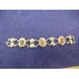Silver Niello style bracelet, set with 3 amber coloured stones